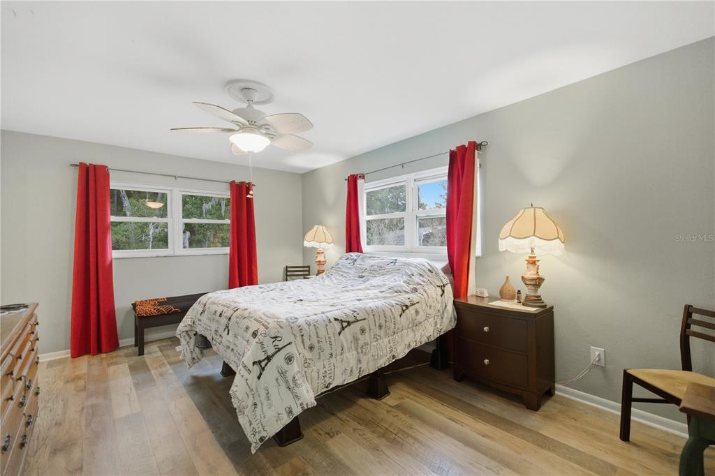 8951 Southwest 202nd Avenue Road Dunnellon, FL 34431 - Photo 15 of 38 a bedroom with a bed and a closet