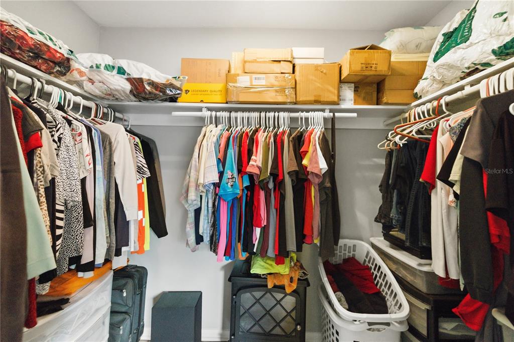 8951 Southwest 202nd Avenue Road Dunnellon, FL 34431 - Photo 18 of 38 a view of walk in closet with clothes
