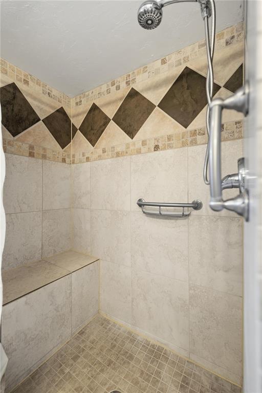 8951 Southwest 202nd Avenue Road Dunnellon, FL 34431 - Photo 22 of 38 a bathroom with a shower