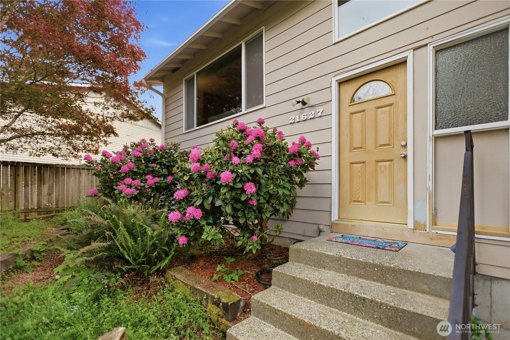 21627 9th Place West Bothell, WA 98021 - Photo 4 of 40 a front view of a house with entryway
