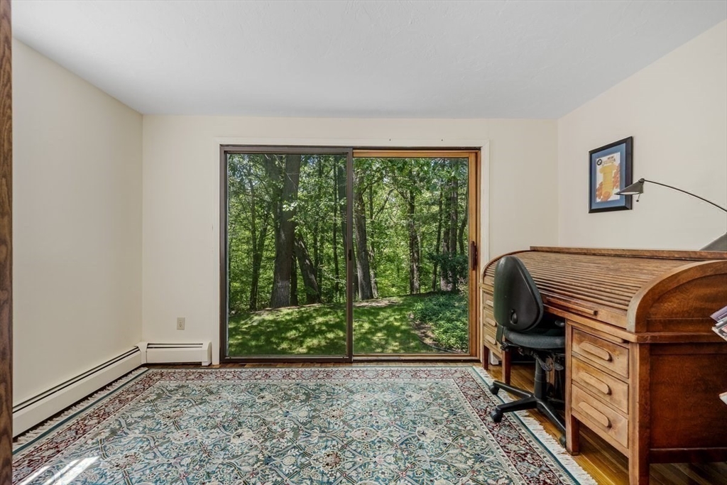 445 Cushing Street Hingham, MA 02043 - Photo 11 of 29 a view of a livingroom with furniture and staircase