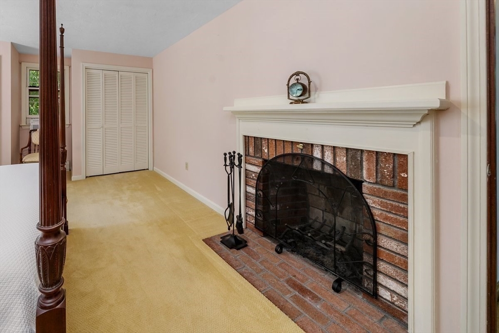 445 Cushing Street Hingham, MA 02043 - Photo 15 of 29 a view of livingroom with furniture and a fireplace