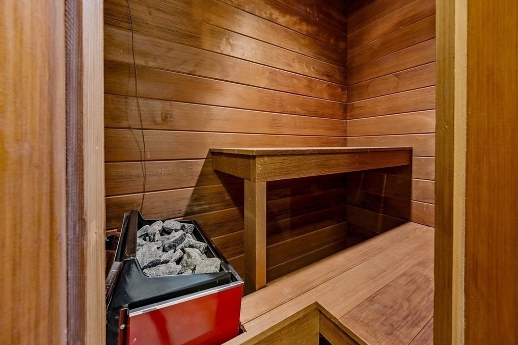 445 Cushing Street Hingham, MA 02043 - Photo 18 of 29 a room with wooden floor and a fireplace