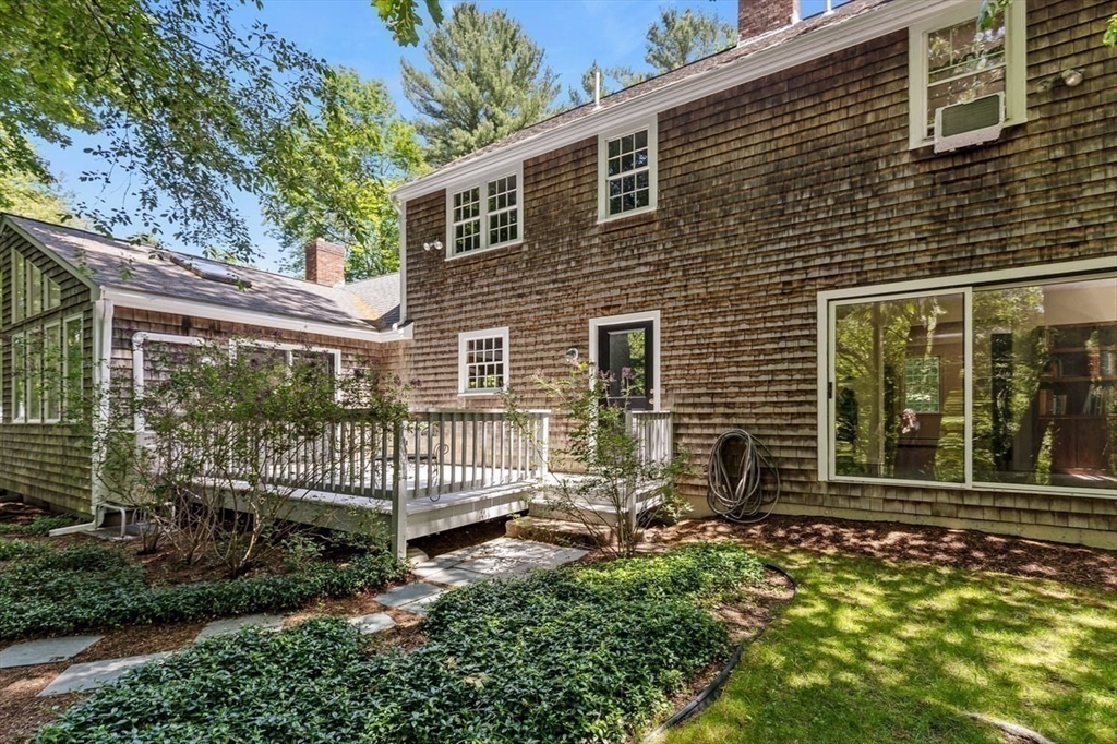 445 Cushing Street Hingham, MA 02043 - Photo 21 of 29 a house view with a garden