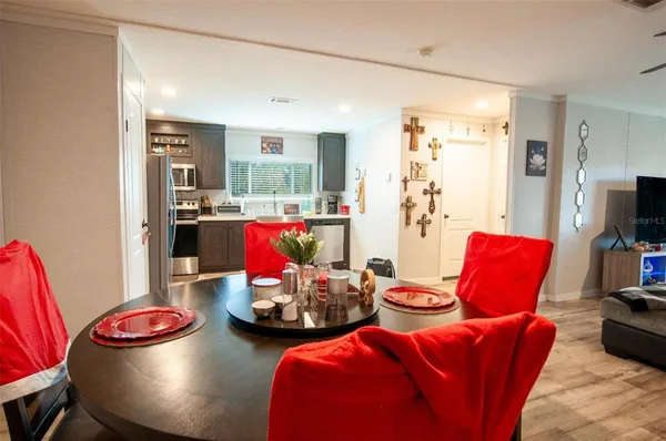 a room with furniture and a wooden floor