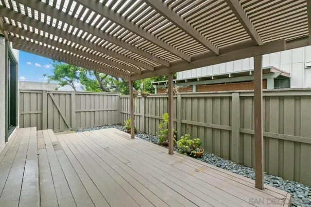 a balcony with wooden floor