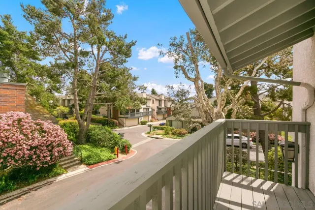 a view of a lake from a balcony