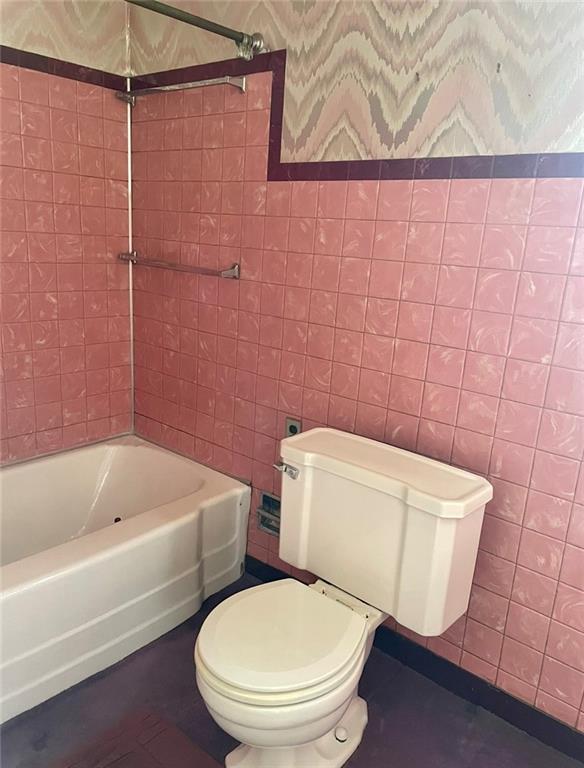 424 Deer Lane Rochester, PA 15074 - Photo 16 of 20 a white toilet sitting next to a bath tub