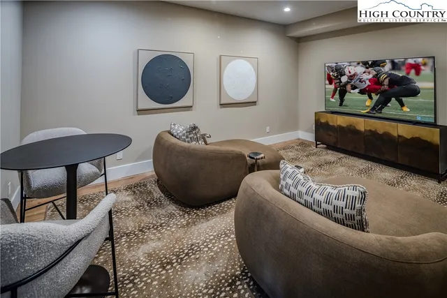 a living room with furniture and a couch