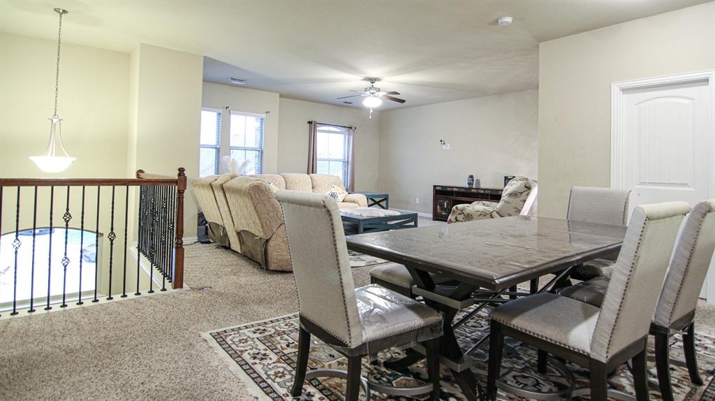 9917 Bodega Bay Road Fort Worth, TX 76177 - Photo 12 of 18 a view of a dining room with furniture and window