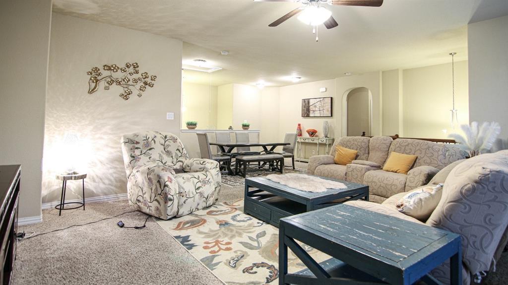 9917 Bodega Bay Road Fort Worth, TX 76177 - Photo 14 of 18 a living room with furniture and white walls