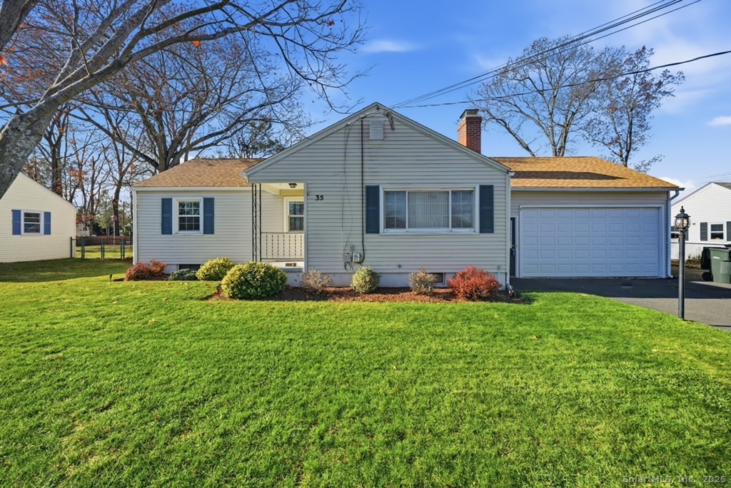 a house view with a garden space