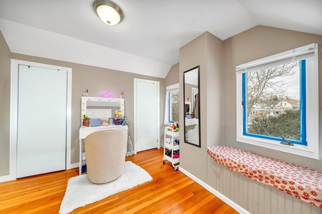 73 Waterhill Street Lynn, MA 01905 - Photo 13 of 33 a living room with furniture and a window