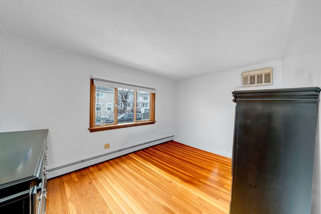 73 Waterhill Street Lynn, MA 01905 - Photo 17 of 33 a view of an empty room with a window