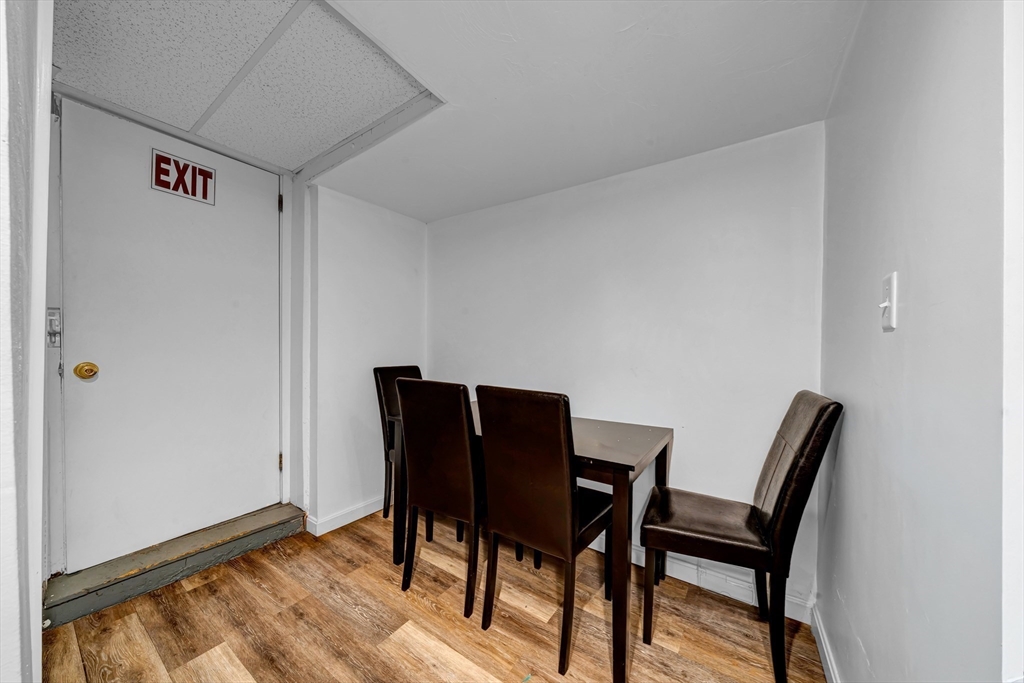 73 Waterhill Street Lynn, MA 01905 - Photo 24 of 33 a view of a workspace area with furniture and wooden floor