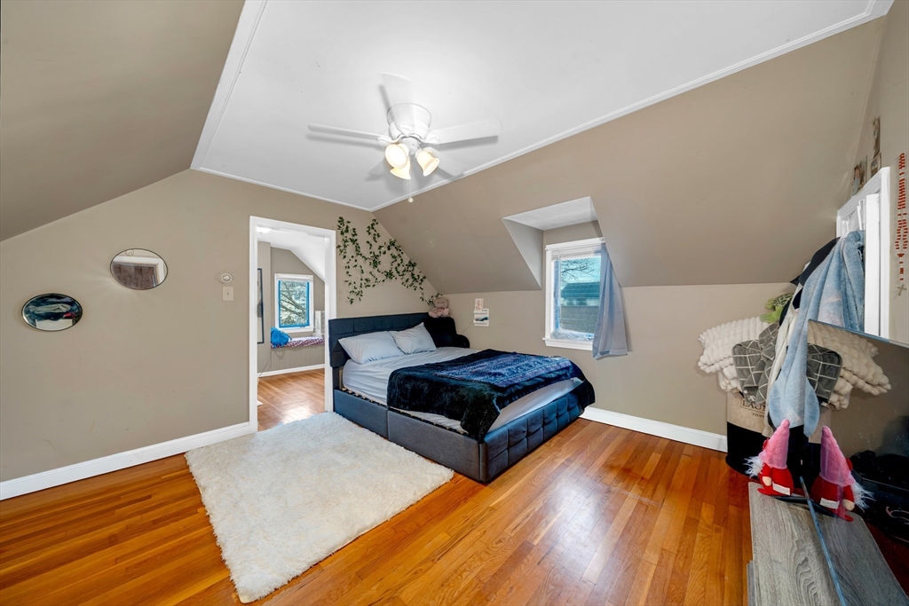 73 Waterhill Street Lynn, MA 01905 - Photo 10 of 33 a living room with furniture and wooden floor