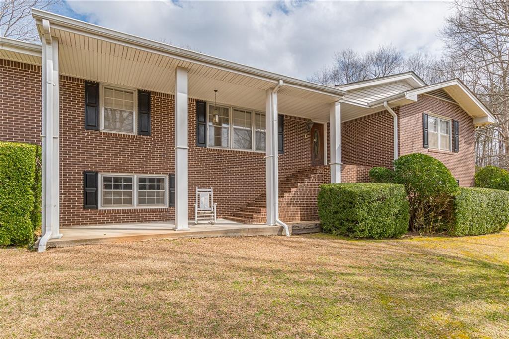 5300 Dukes Road Douglasville, GA 30135 - Photo 1 of 1 a front view of a house with a yard