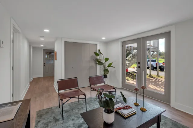 a workspace with furniture and a potted plant