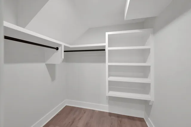 a view of an empty walk in closet