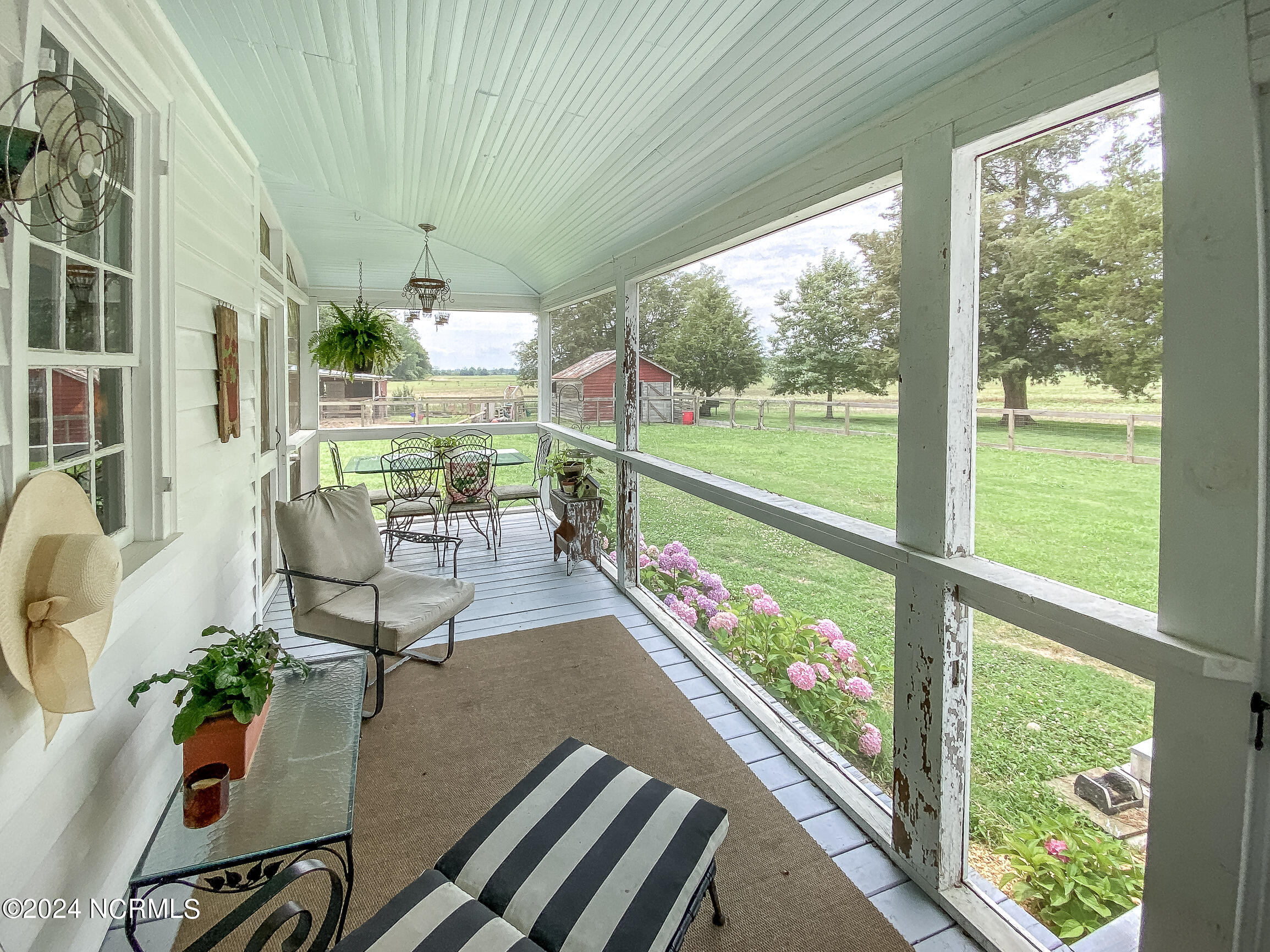 398 New Hope Road Hertford, NC 27944 - Photo 3 of 72 Screened sunroom
