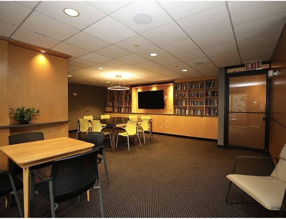 111 Perkins Street, Unit 108 Boston, MA 02130 - Photo 8 of 11 a view of a dining room with furniture window and outside view