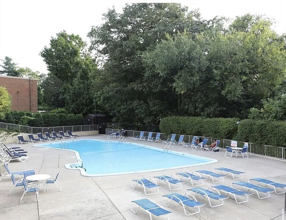 111 Perkins Street, Unit 108 Boston, MA 02130 - Photo 9 of 11 a view of a swimming pool with a patio