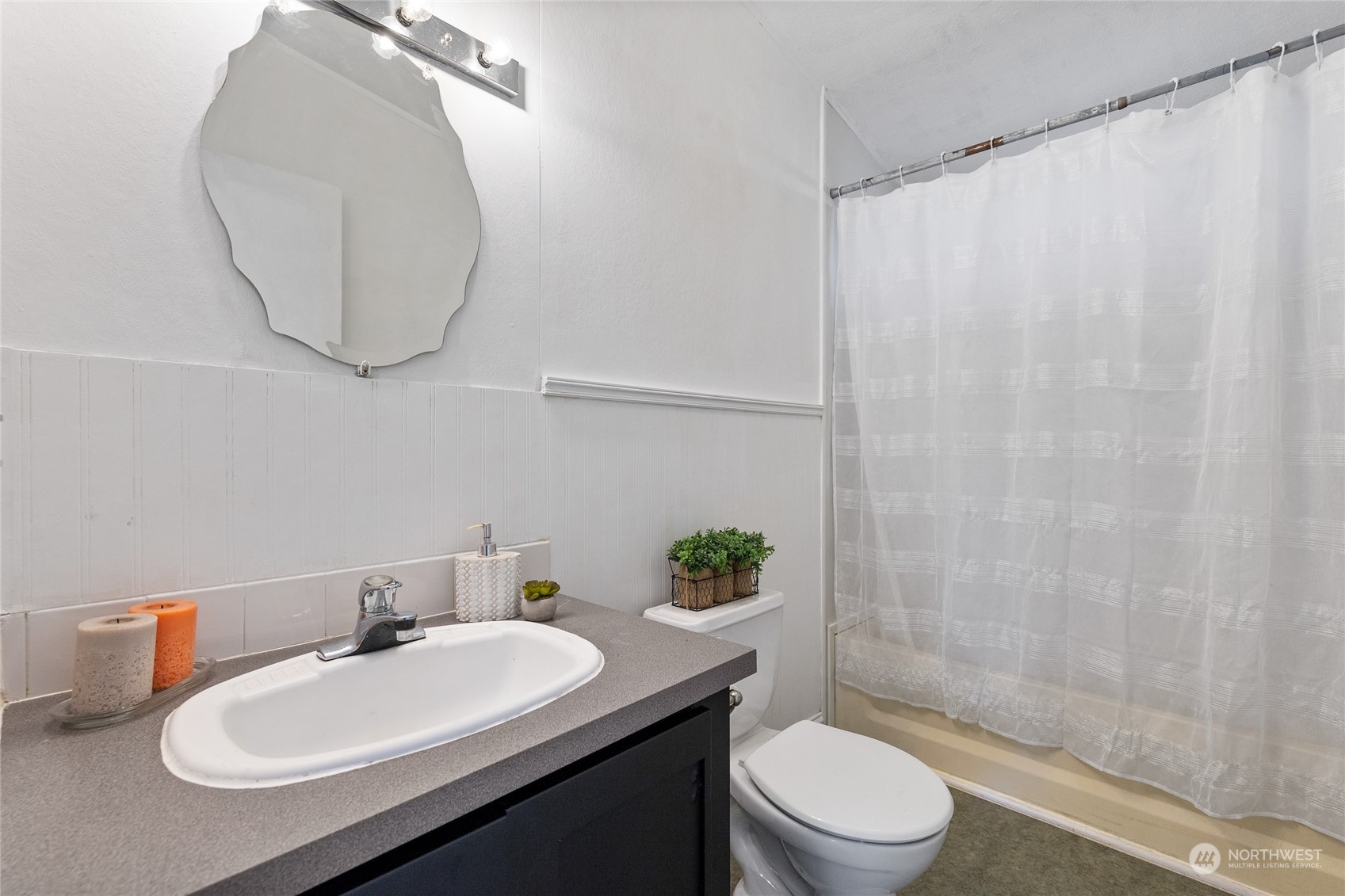 17910 Michelles Lane Southwest Rochester, WA 98579 - Photo 18 of 35 a bathroom with a sink a toilet and a mirror
