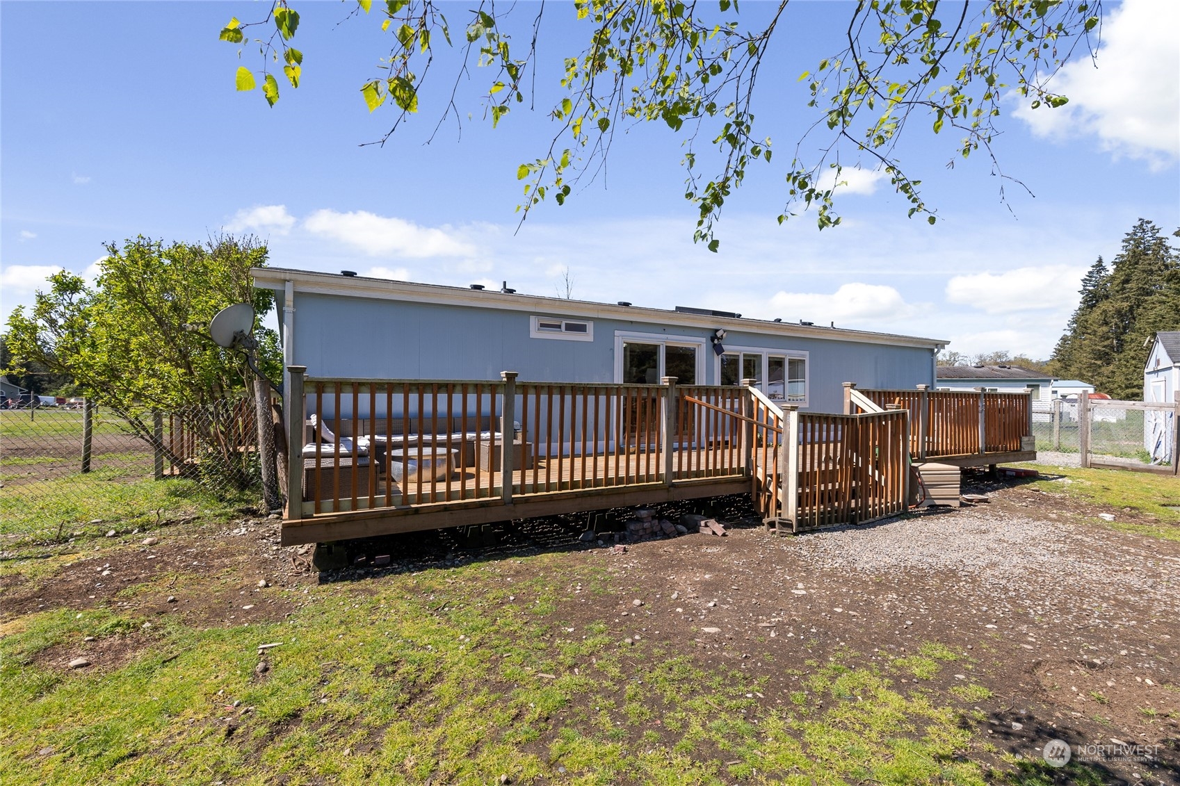 17910 Michelles Lane Southwest Rochester, WA 98579 - Photo 20 of 35 a view of a house with a yard in the patio