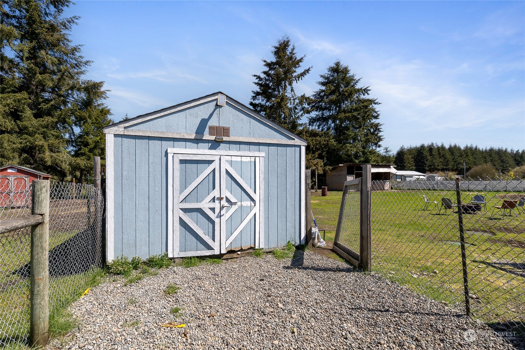 17910 Michelles Lane Southwest Rochester, WA 98579 - Photo 27 of 35 a view of a house with backyard