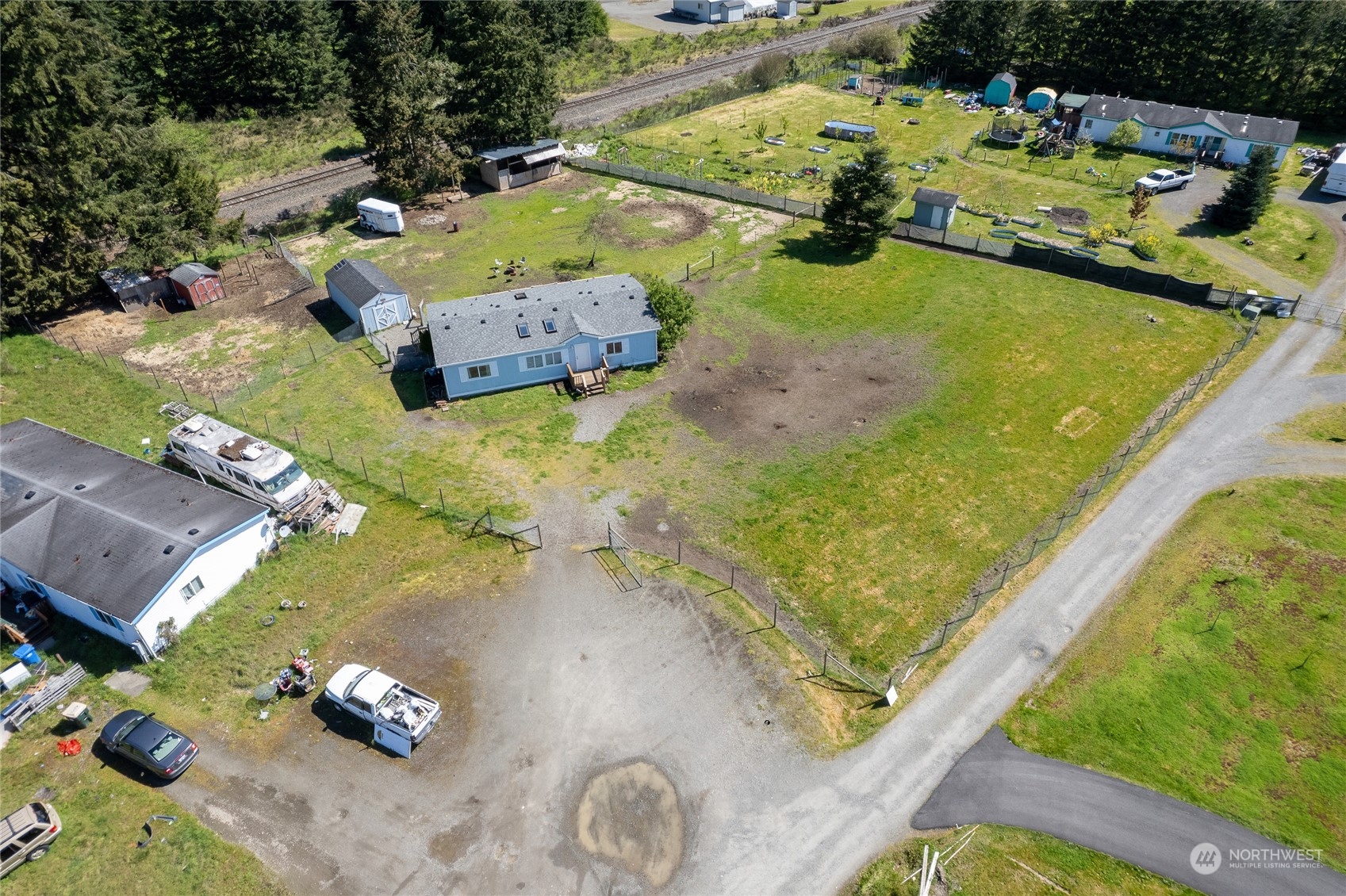 17910 Michelles Lane Southwest Rochester, WA 98579 - Photo 28 of 35 an aerial view of a house with a yard
