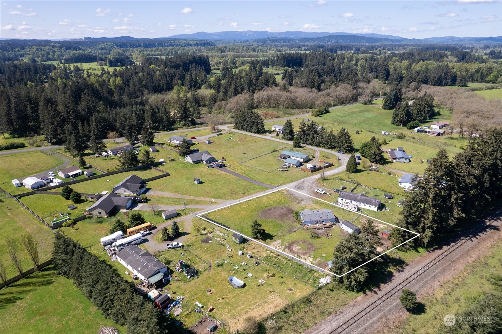 17910 Michelles Lane Southwest Rochester, WA 98579 - Photo 32 of 35 an aerial view of a house with a garden