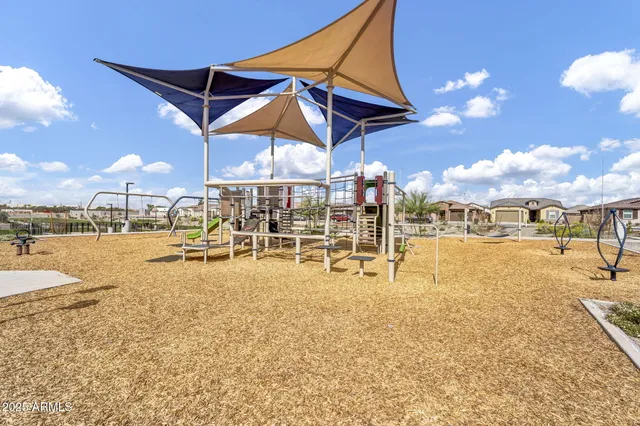 a view of a chairs and tables in the patio
