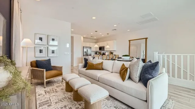 a view of a dining room with furniture and a window