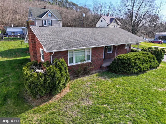 a aerial view of a house with garden