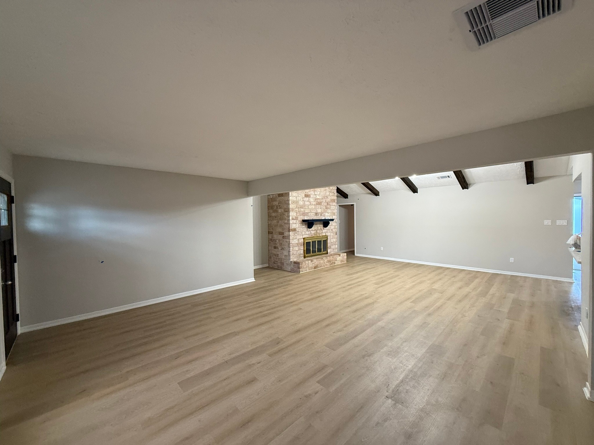 10130 Sagedale Drive Houston, TX 77089 - Photo 12 of 36 a view of empty room with wooden floor