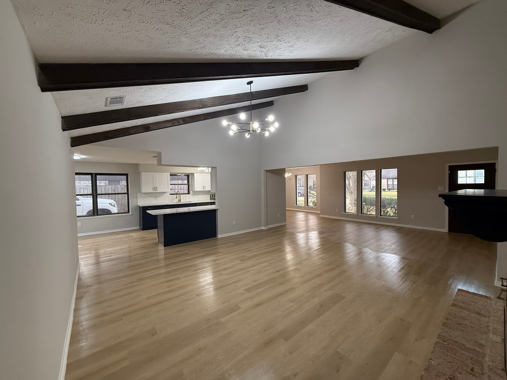 10130 Sagedale Drive Houston, TX 77089 - Photo 14 of 36 a view of a room with wooden floor and fire place