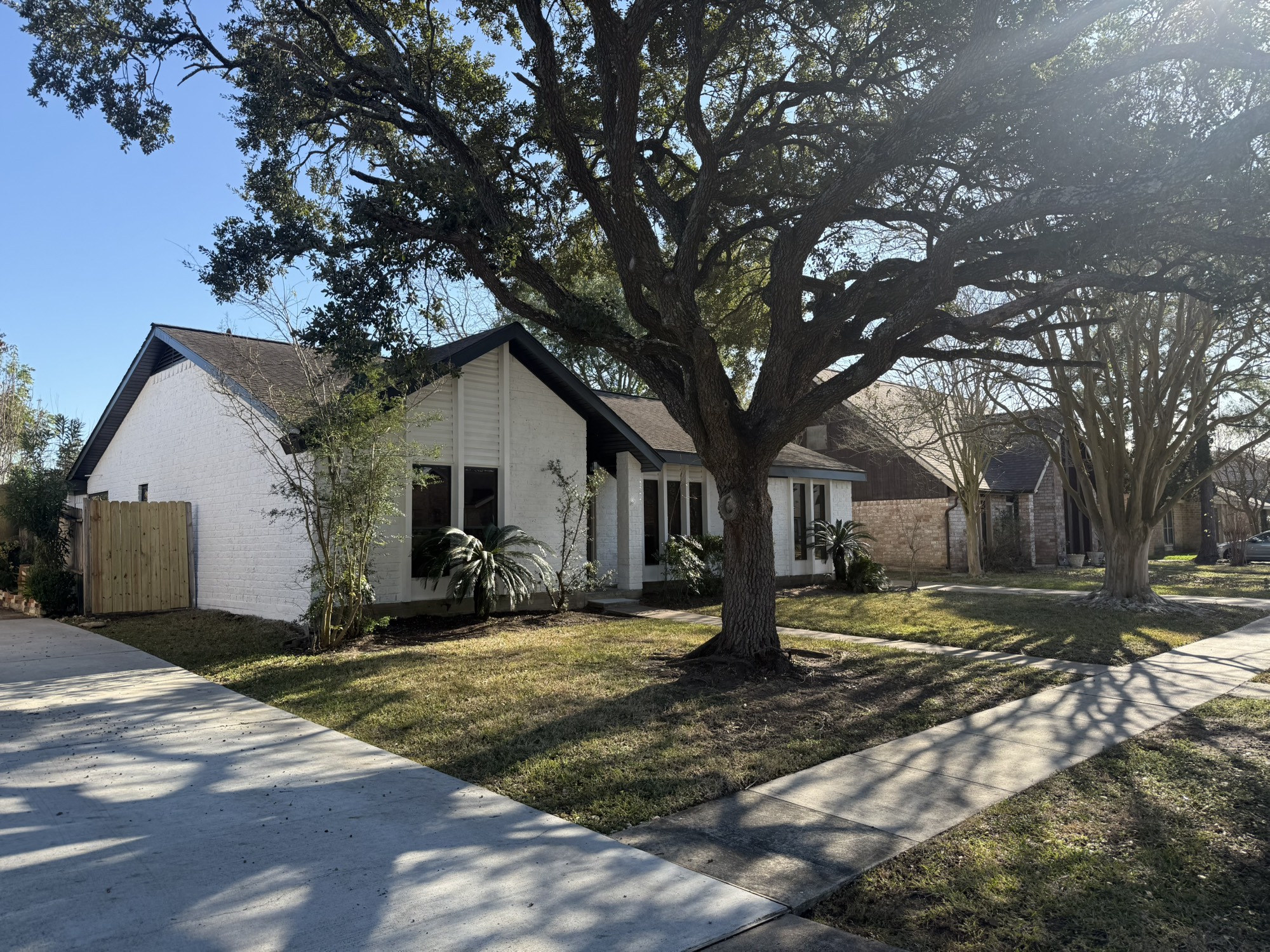 10130 Sagedale Drive Houston, TX 77089 - Photo 2 of 36 a view of a house with a yard