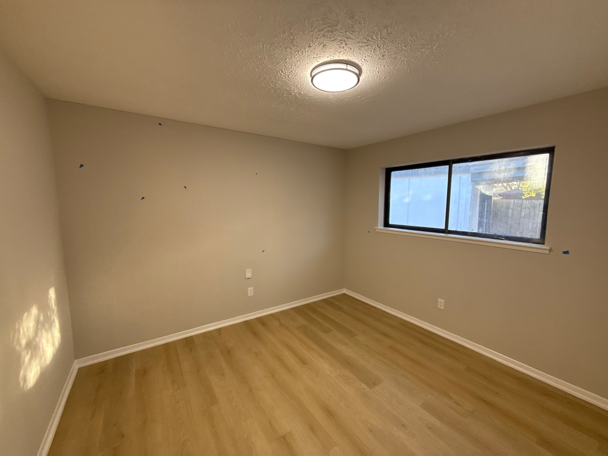 10130 Sagedale Drive Houston, TX 77089 - Photo 23 of 36 an empty room with a window