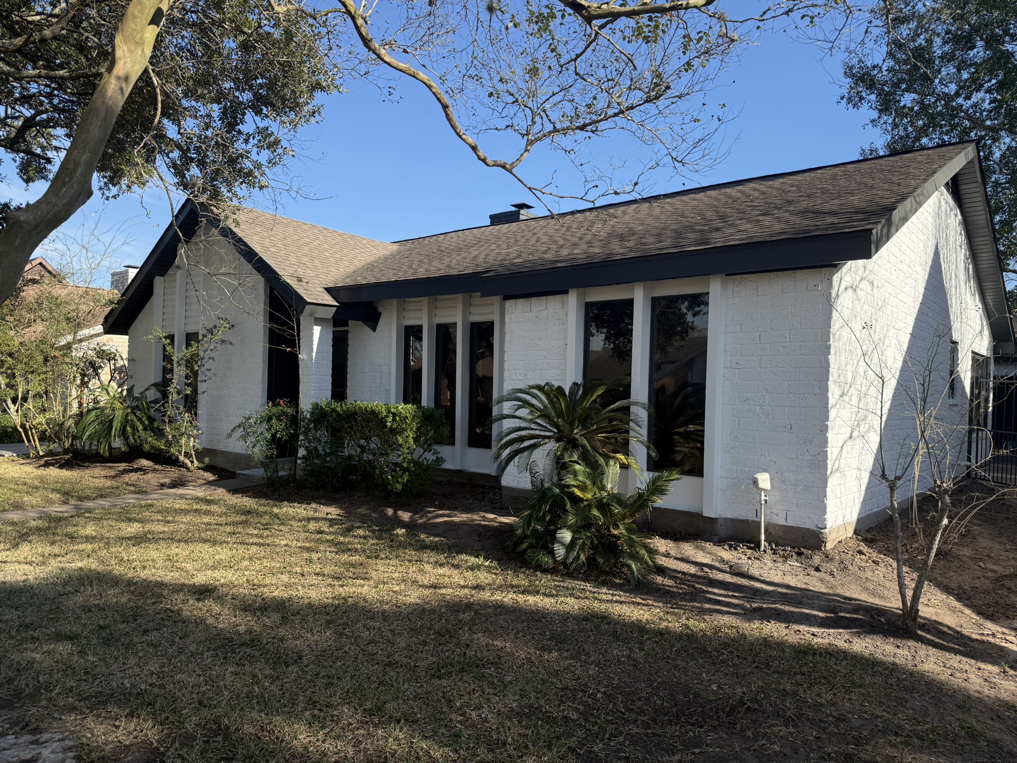 10130 Sagedale Drive Houston, TX 77089 - Photo 3 of 36 a view of a house with backyard and sitting area