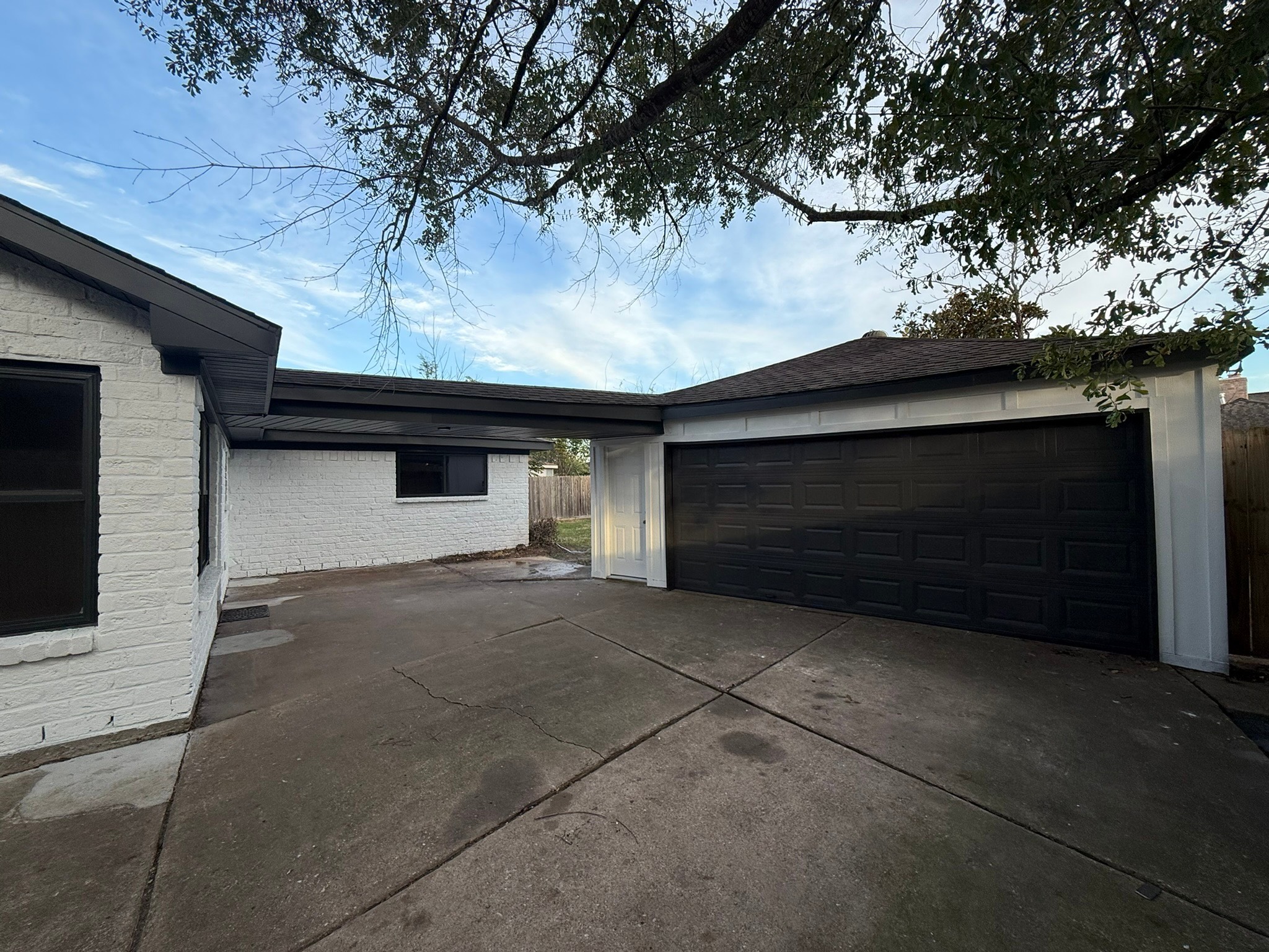 10130 Sagedale Drive Houston, TX 77089 - Photo 35 of 36 a front view of a house with a garage
