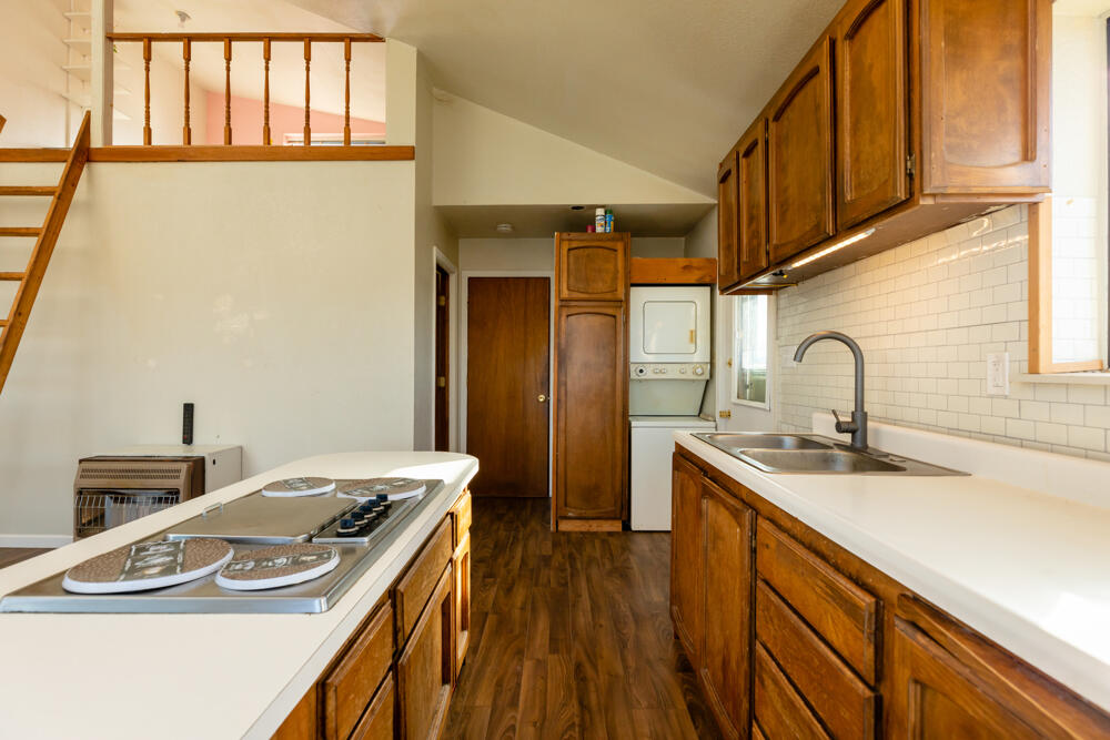 21550 Sprague River Road Chiloquin, OR 97624 - Photo 13 of 34 Second unit kitchen, view to bedroom