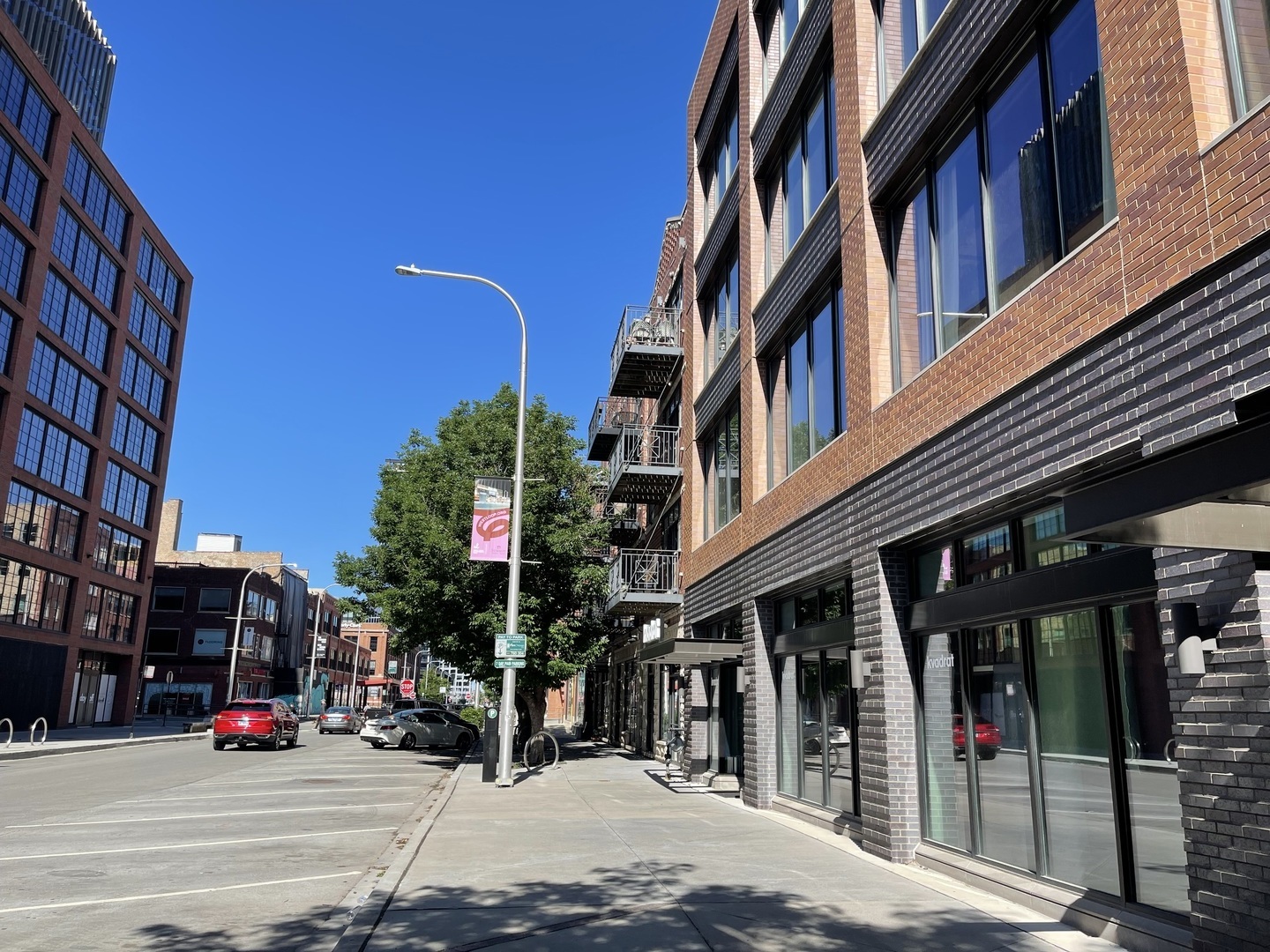 1048 West Fulton Street, Unit 2 Chicago, IL 60607 - Photo 22 of 22 a view of street with tall buildings