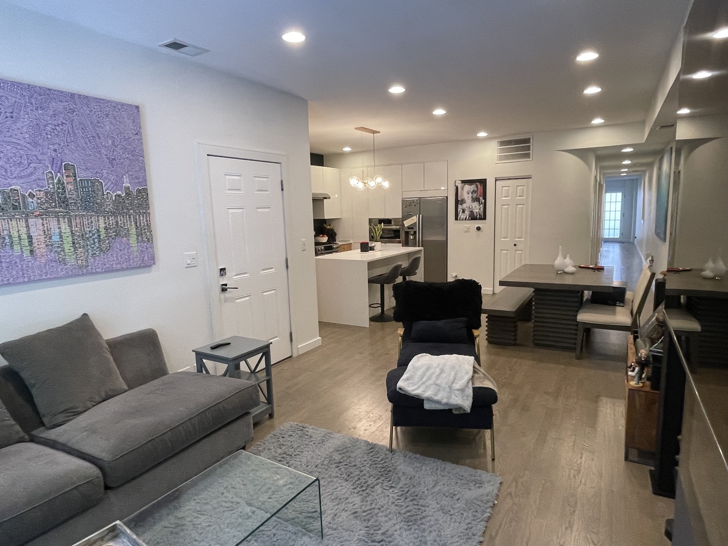 1048 West Fulton Street, Unit 2 Chicago, IL 60607 - Photo 4 of 22 a living room with furniture and a large window