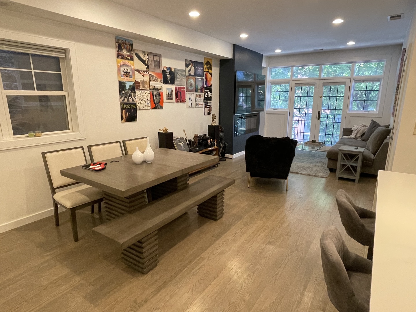 1048 West Fulton Street, Unit 2 Chicago, IL 60607 - Photo 5 of 22 a living room with furniture a flat screen tv and a large window