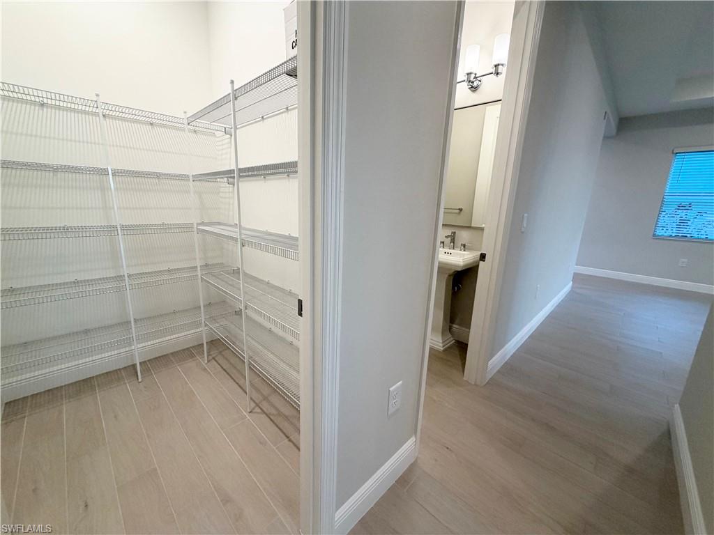 4013 Perseus Street Naples, FL 34120 - Photo 6 of 34 Pantry and Half bath