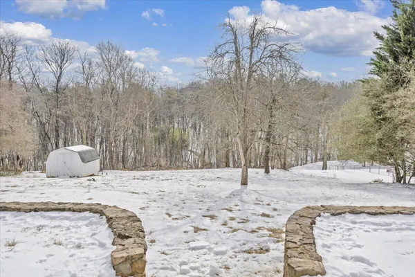 a view of a backyard of snow