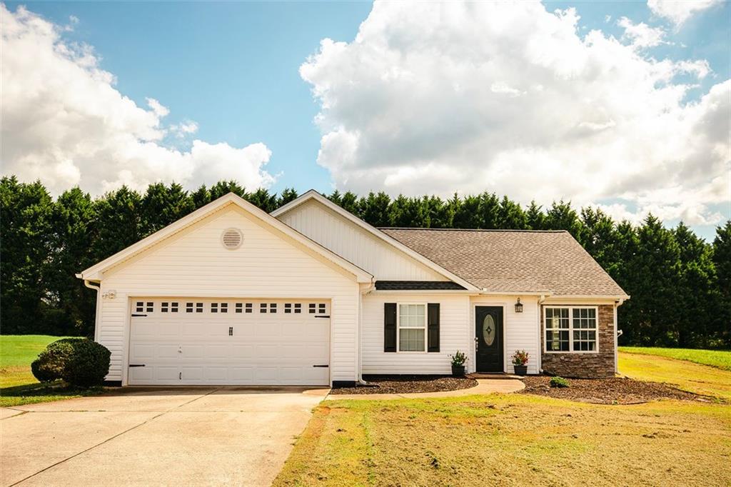 530 Cherokee Road Winder, GA 30680 - Photo 1 of 1 a view of a house with a yard