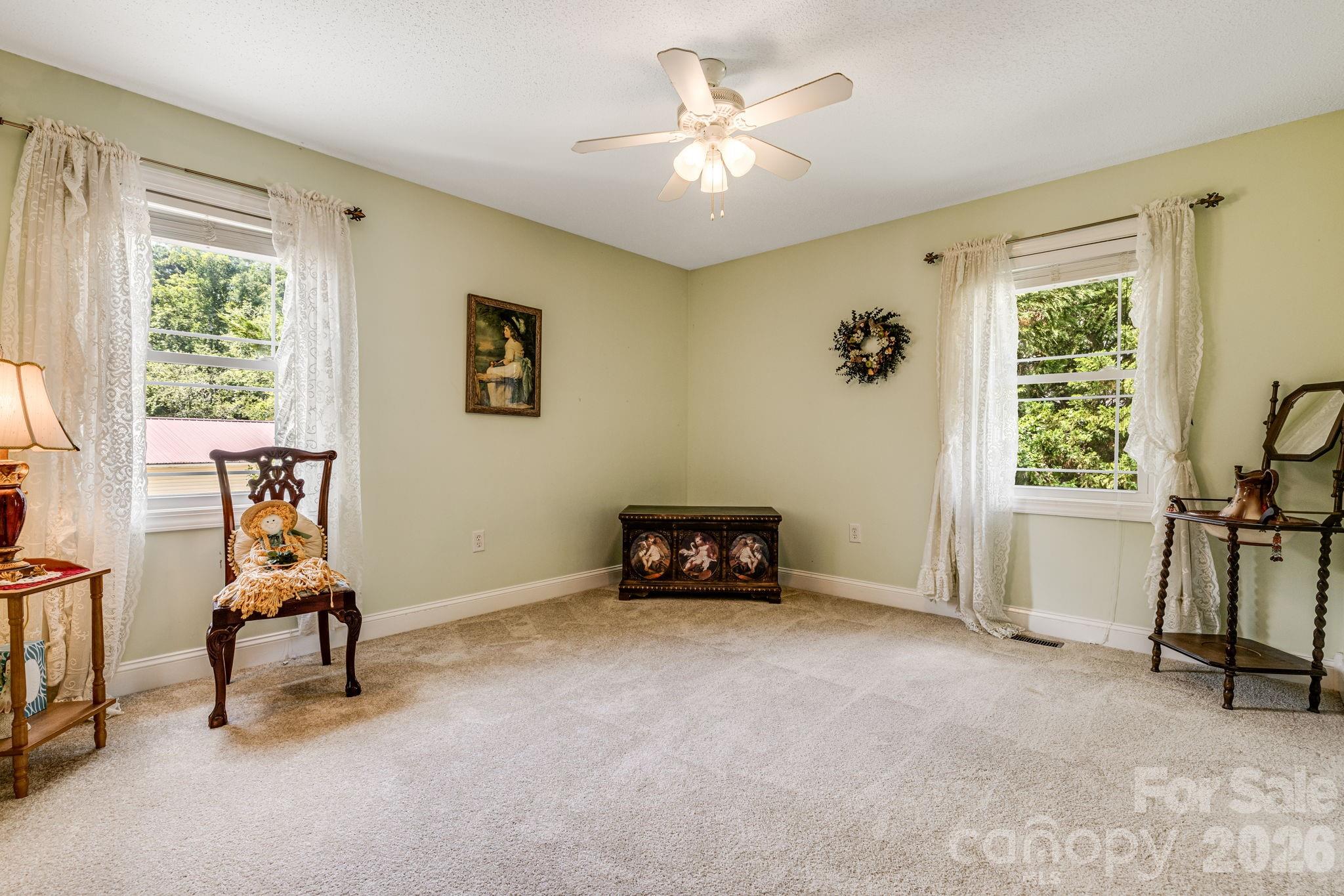 350 Old Sunset Hill Road Hendersonville, NC 28792 - Photo 17 of 40 a living room with furniture and a window
