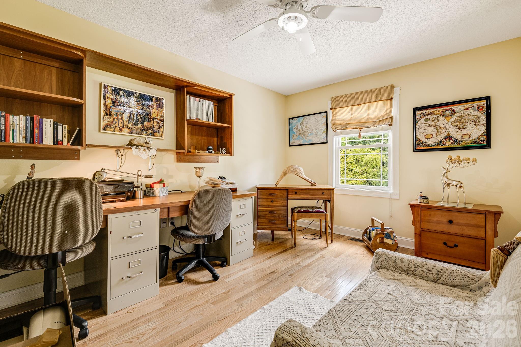 350 Old Sunset Hill Road Hendersonville, NC 28792 - Photo 6 of 40 a workspace with furniture and window