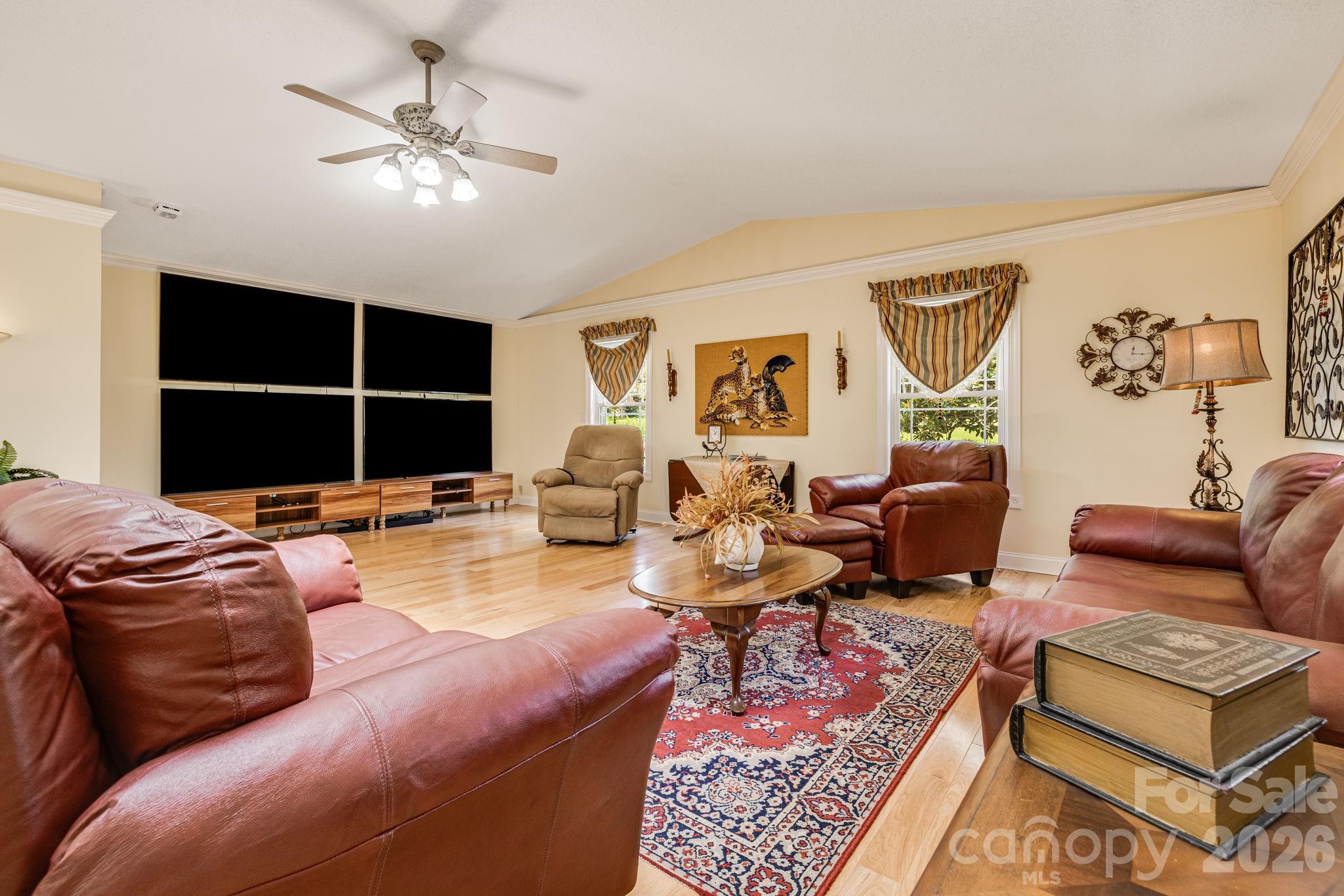 350 Old Sunset Hill Road Hendersonville, NC 28792 - Photo 10 of 40 a living room with furniture a rug and a window